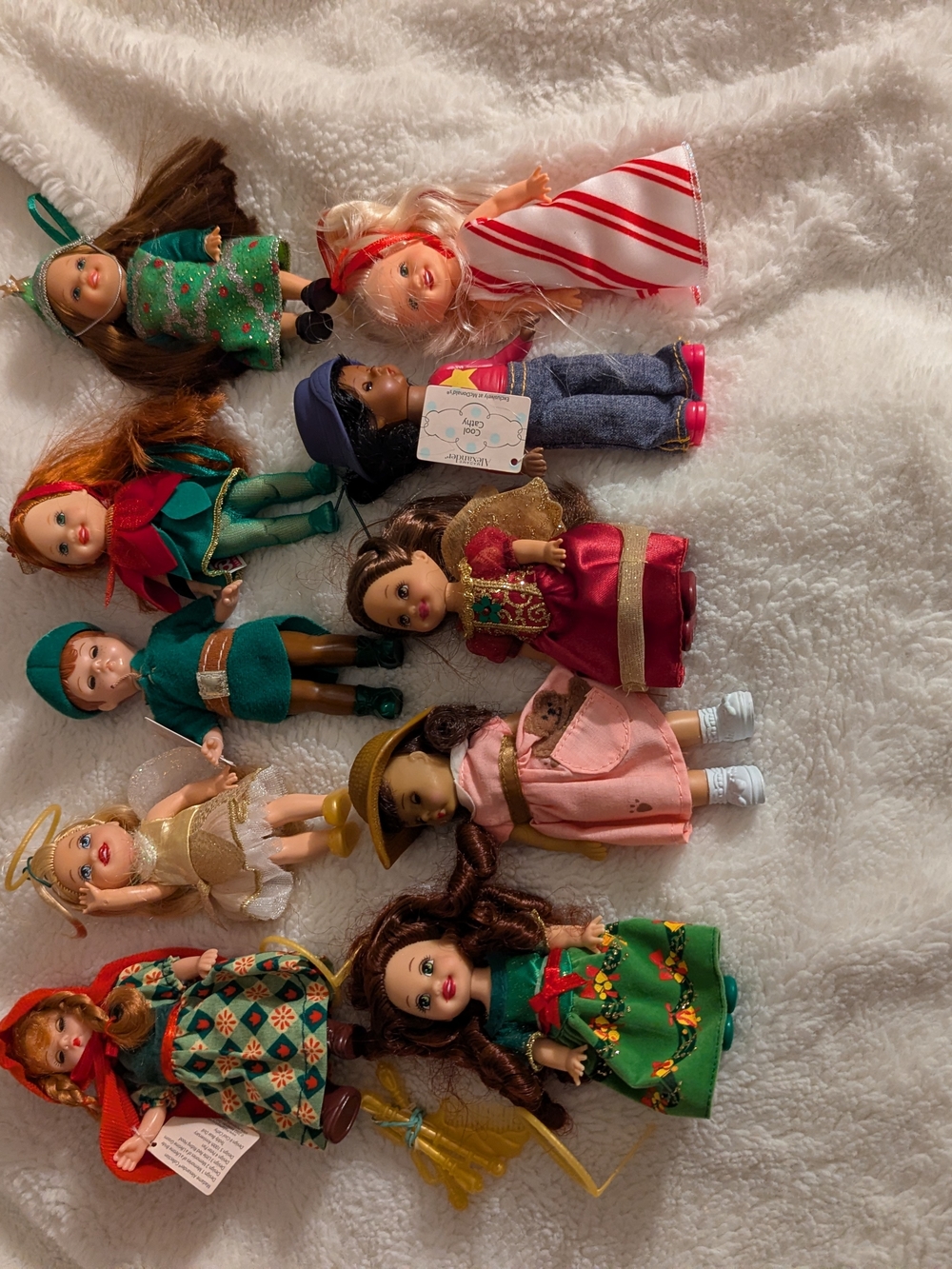 An assortment Of Madame Alexander & Barbie Mini Dolls. A Total Of 10